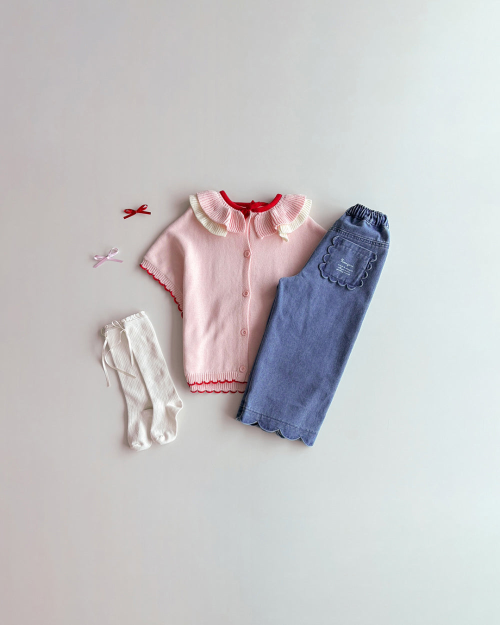 ROANJANE Fling knit cape